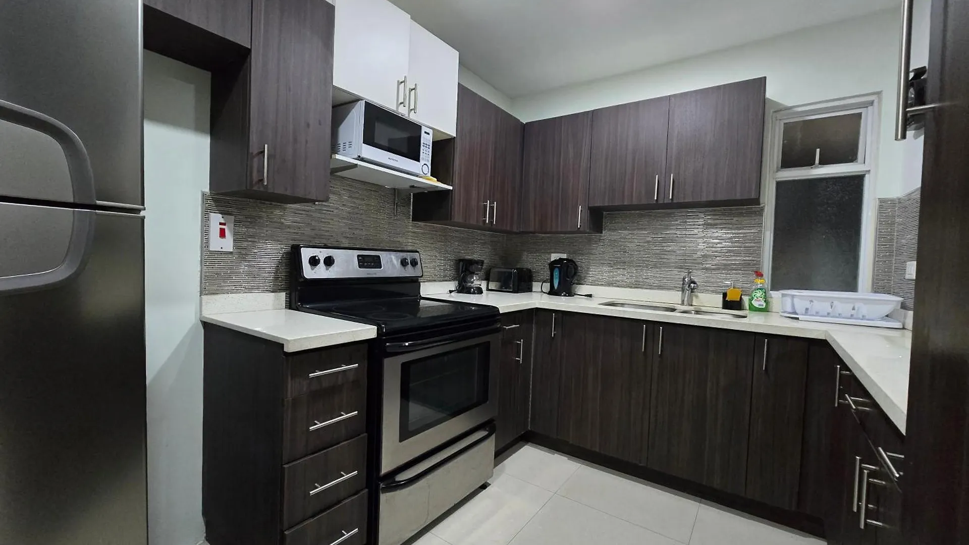 Апартаменты Charming Serene Penthouse With Pool & Gym New Кингстон Ямайка
